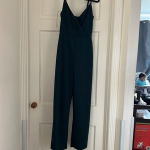 Dark emerald green jumpsuit from Trixxi Company in small